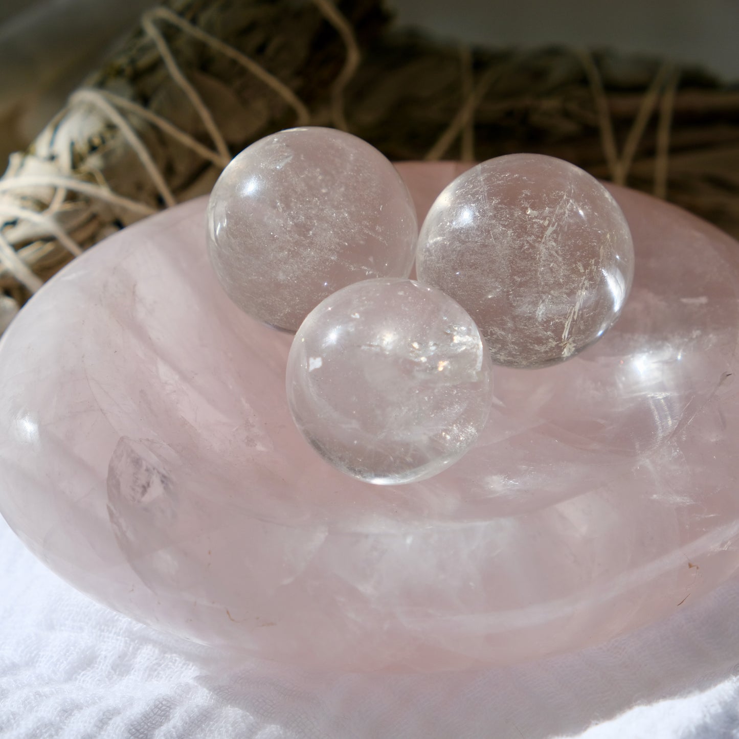 Rose Quartz carved bowls with clear quartz spheres inside