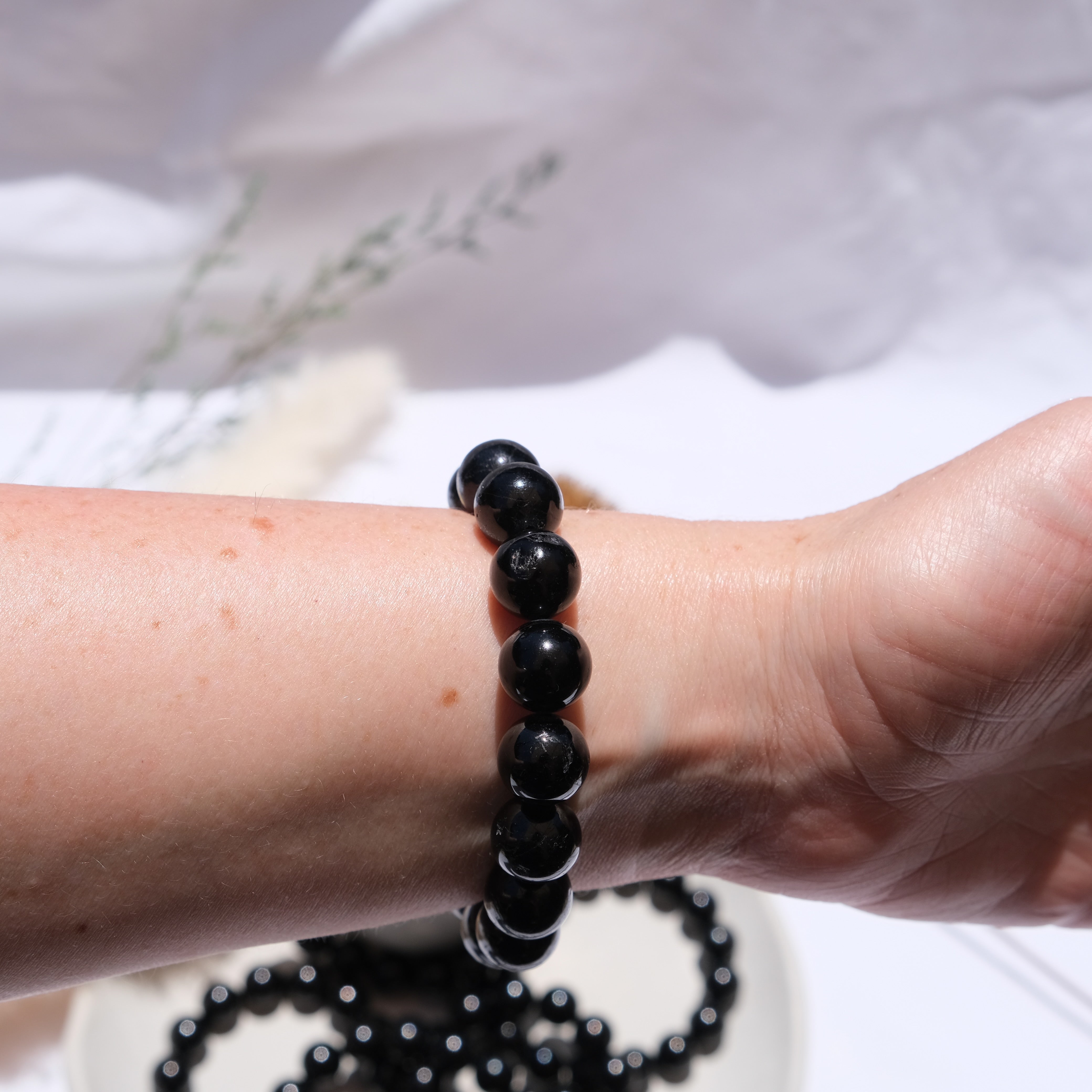 Black tourmaline online bracelet which hand